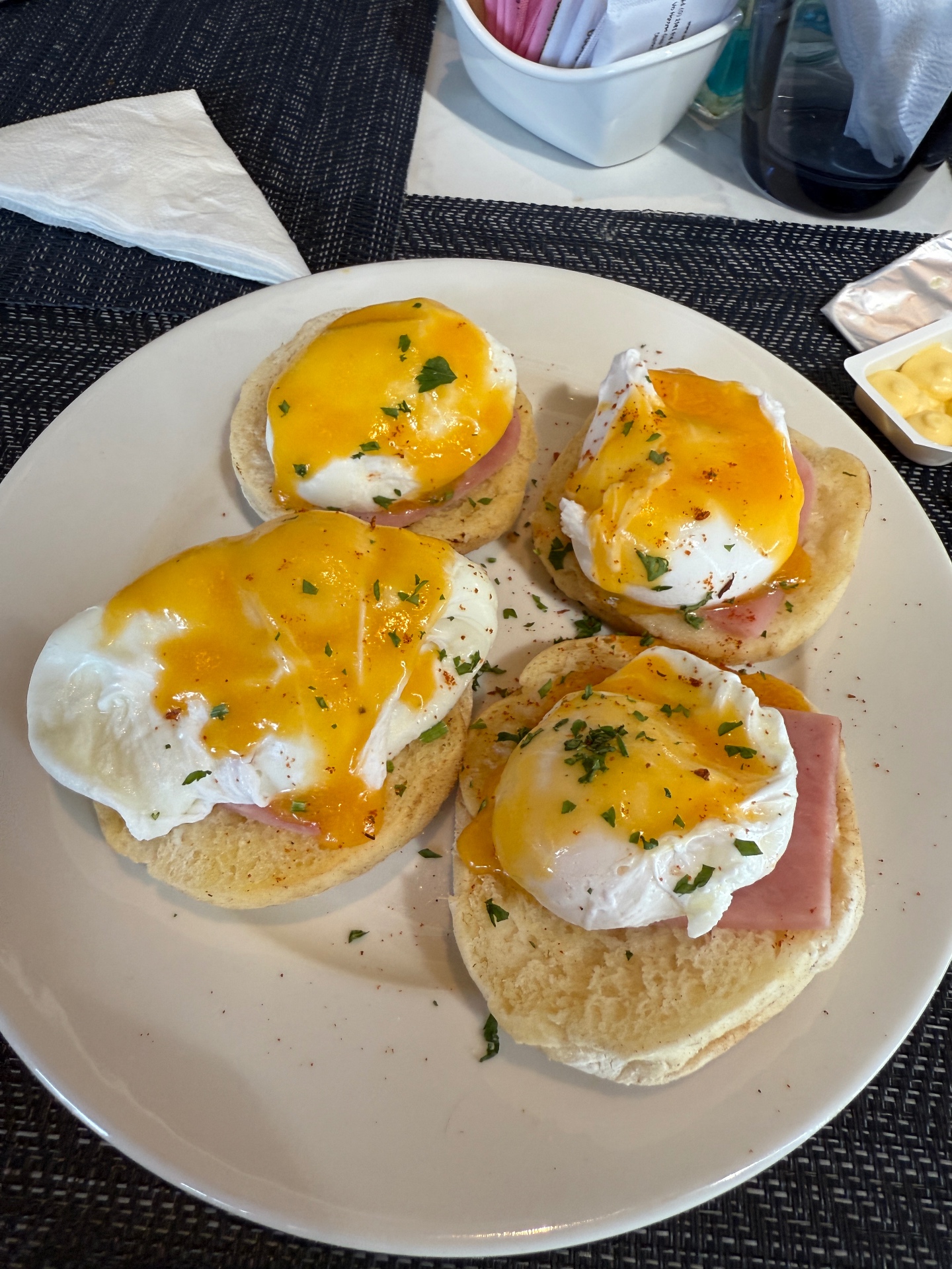 Eggs Benedict with poached eggs and hollandaise sauce — a high protein breakfast example for adults over 35 looking to improve energy, body composition and metabolic health