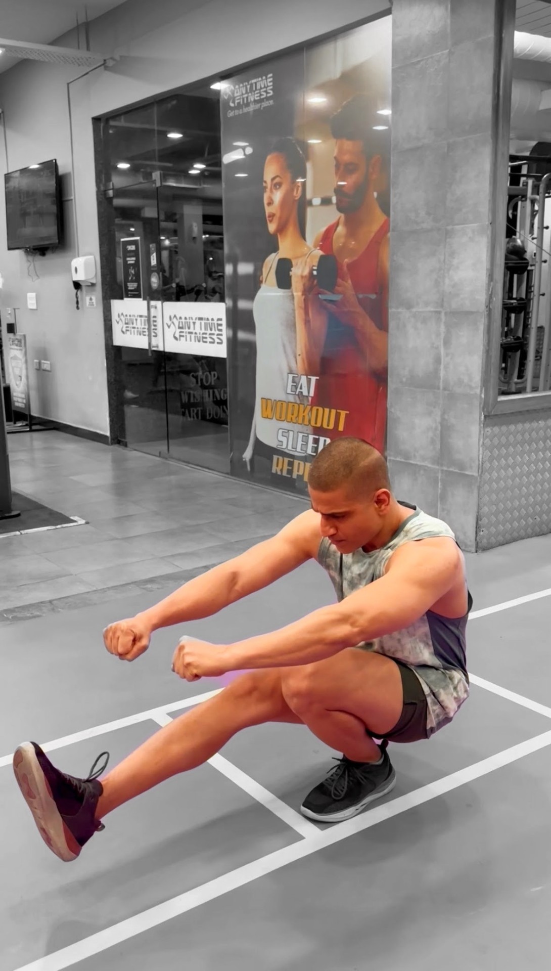 Shiva Malhotra performing a pistol squat — a closed chain exercise that builds real-world leg strength, balance and joint stability for adults over 35